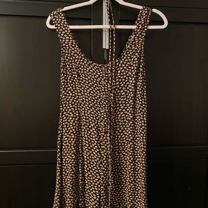 Black romper with beautiful tiny flowers from American Eagle size xs